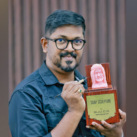 Biju CG working on a soap sculpture